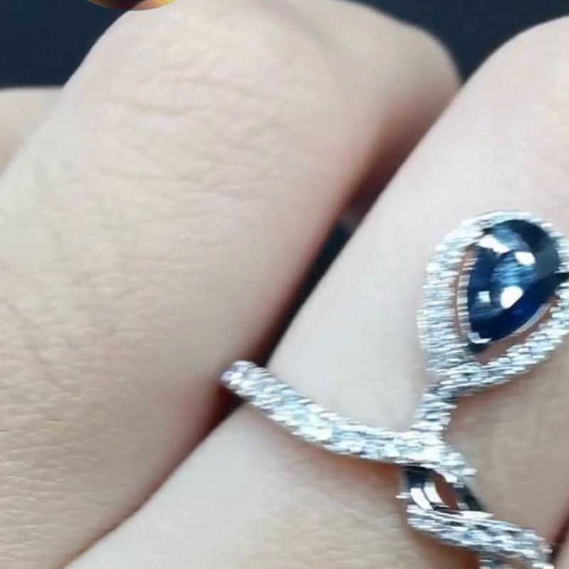 Infinity Pear Ring - natural diamonds in 18K Hong Kong gold.