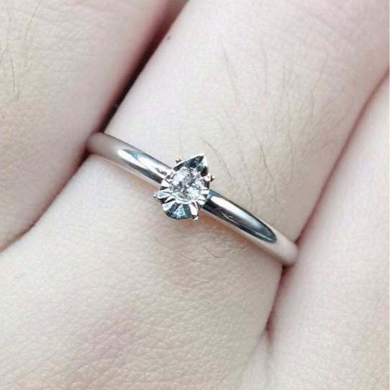 Pear Illusion Solitaire Engagement Ring - natural diamonds in 18K Hong Kong gold.