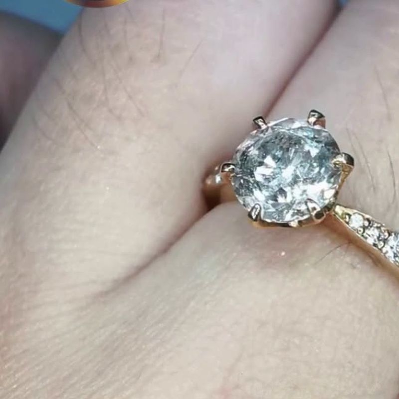 Round Cut Solitaire Ring - natural diamonds in 18K Japan gold.